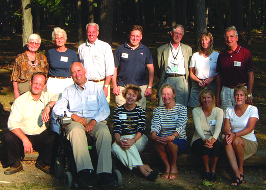 LGLC Board of Directors in 2001. Front row: Tim is second from left, David Darrin is seated at Tim's right, Judy Larter is fourth from the left. Top row: Peg Olsen is second from the right.